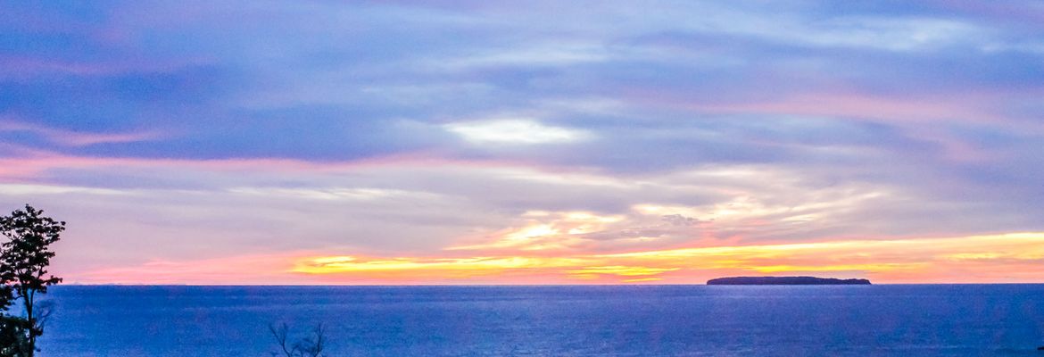 sunset with cano island view 2