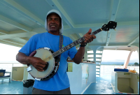        iguana catamaran tour thomas plays banjo 
  - Costa Rica
