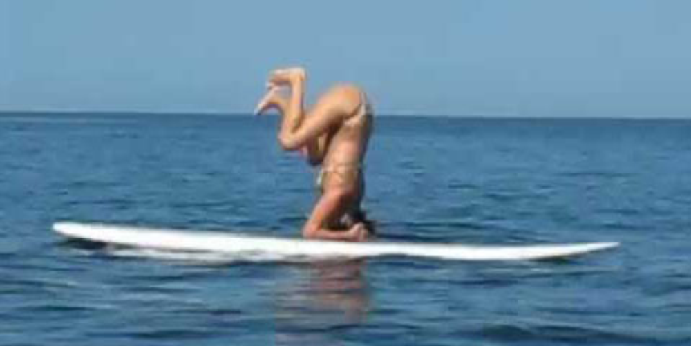 sup surfer handstands
 - Costa Rica