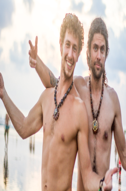 two men wearing pinecones envision festival costa rica
 - Costa Rica
